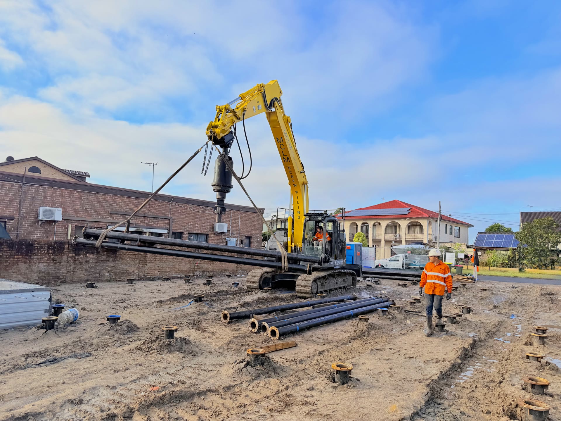 Residential construction supported by steel screw piles